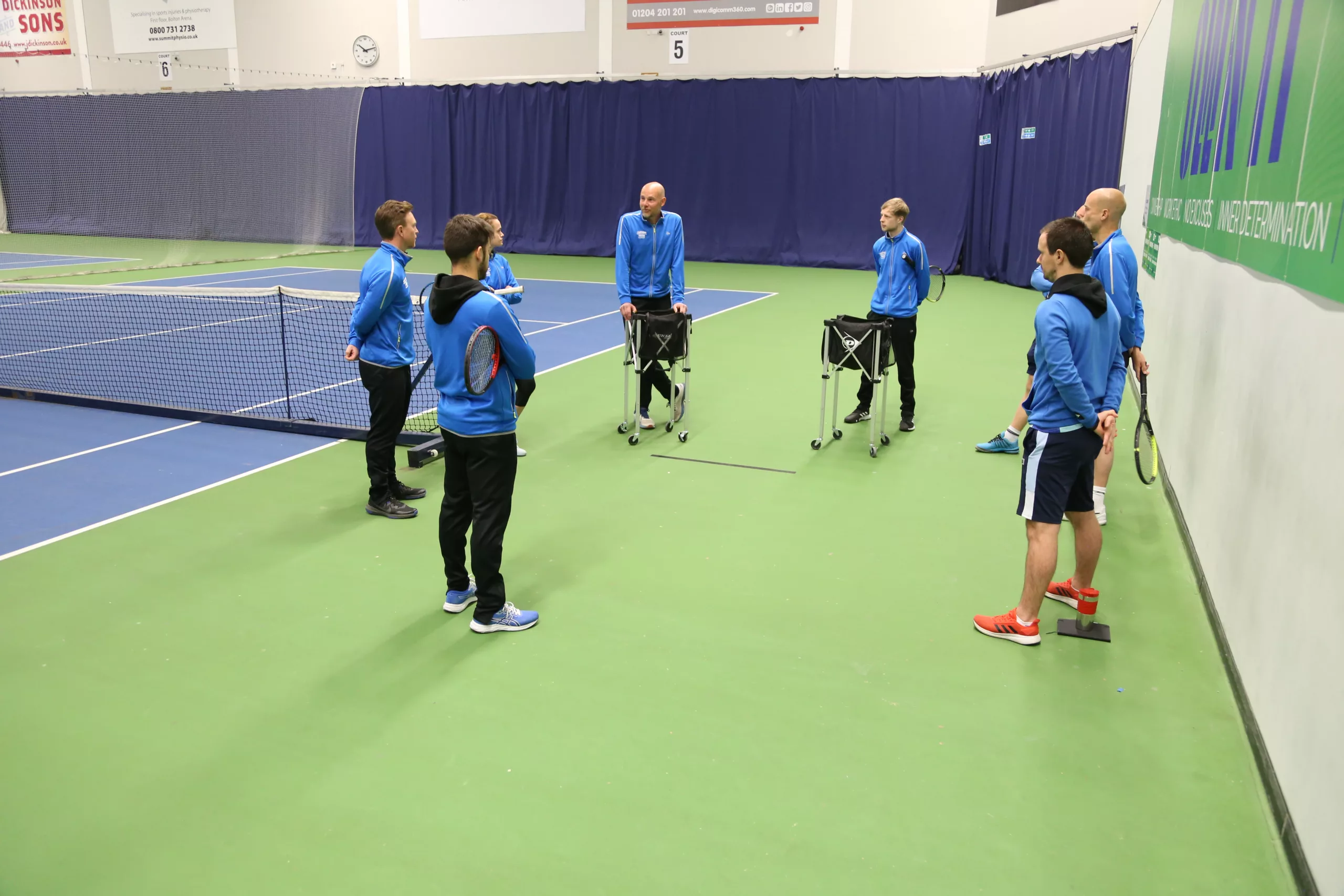 Tennis lesson being conducted
