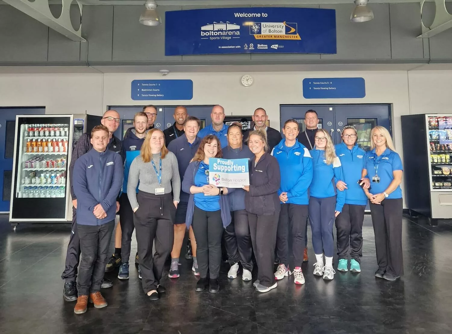 Bolton Arena assign Bolton Hospice as chosen charity and take snap in Bolton Arena reception with team to celebrate