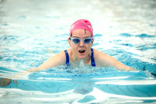 Lady swimming in pool at Sir Jason Kenny Centre