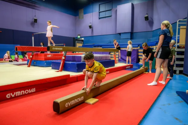 Children using gymnastics apparatus at Active Bolton Arena