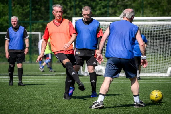 Men playing walking football at Active Bolton Arena