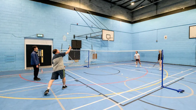 People playing badminton at Westhoughton Leisure Centre